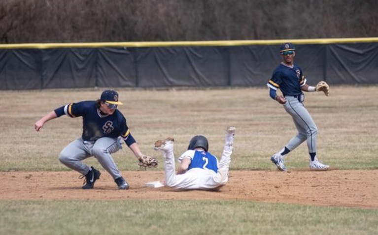 Sophomore Caleb Wurster steals second on Saturday–photo by Reflections by Rob, LLC.